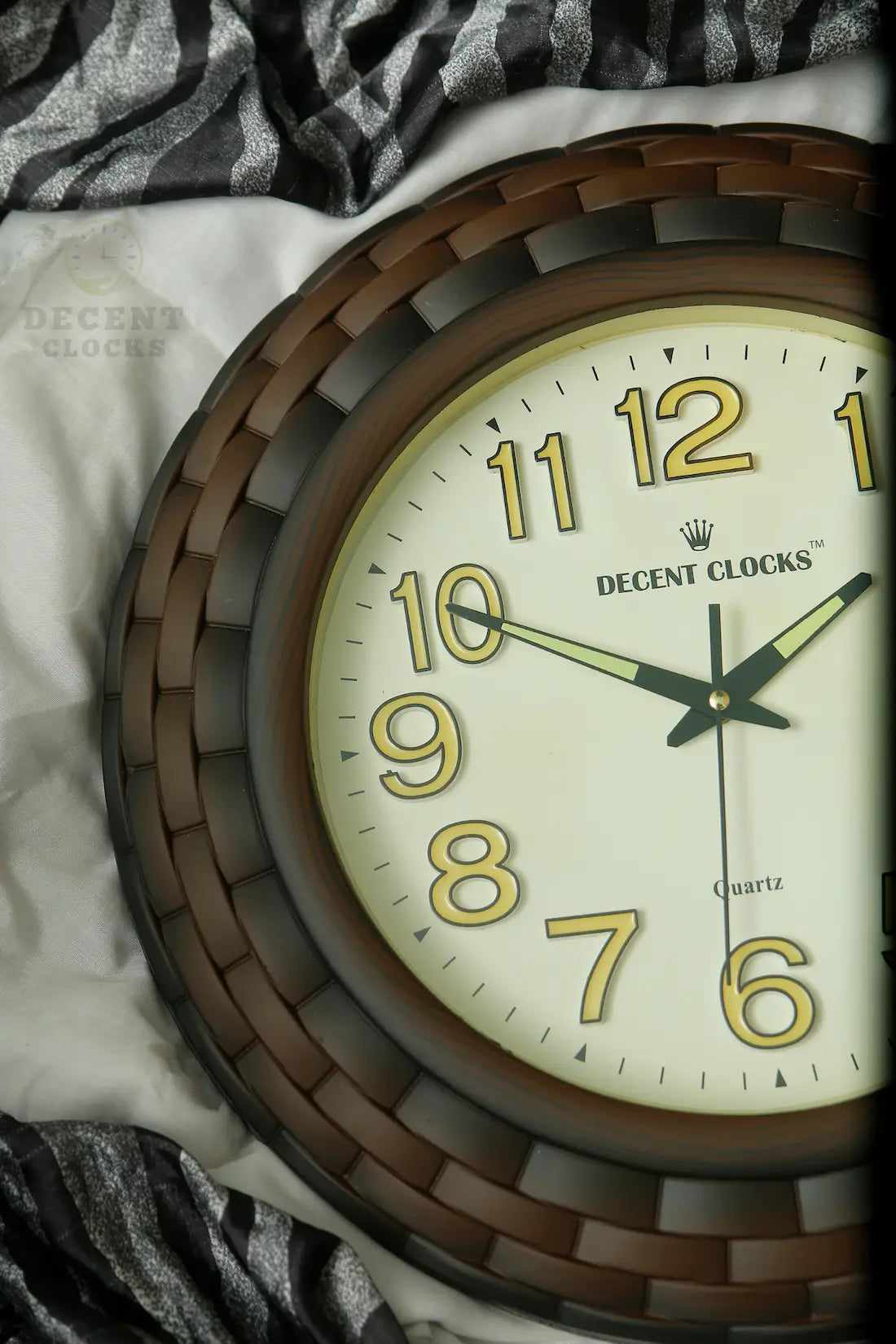 Wall clock with brown frame and white face displaying the time, brand 'Decent Clocks' visible. 
Cream_Brown_Glowing_wall-clock– Large 