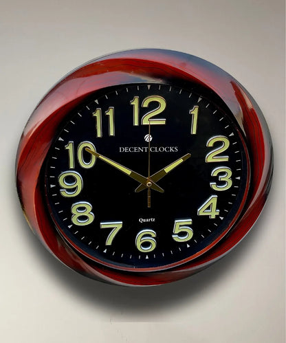 Close-up of glowing wall clock dial and golden numbers