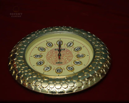 royal golden fancy wall clock image on a red background showing details of it