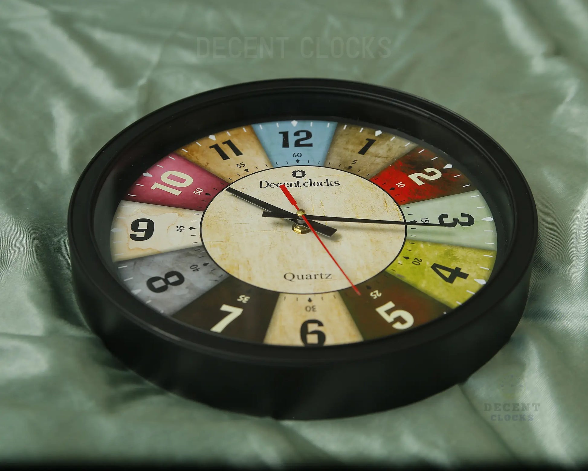 Modern classic wall clock zoomin view on a light green backround