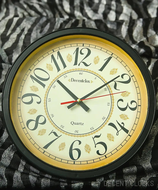 Front main view of Unique Shahi Wall Clock showing full black and gold royal design.