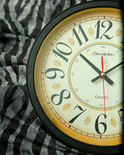 Right side close-up of Unique Shahi Wall Clock highlighting golden leaf pattern and frame.